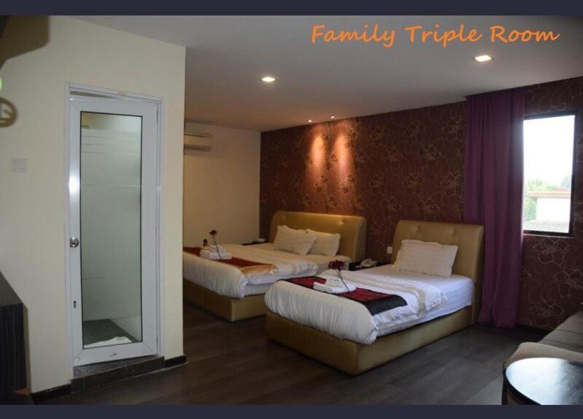 I Garden Hotel อิโปห์ ภายนอก รูปภาพ